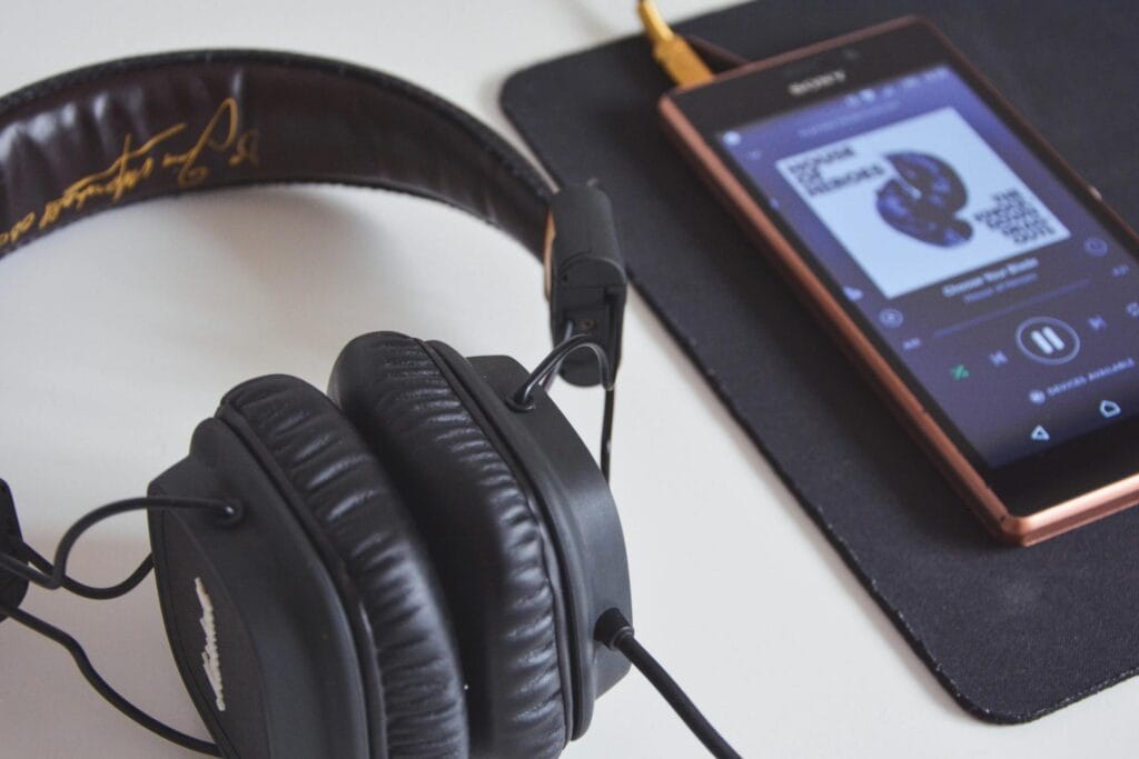 Old Apple music player with headphones