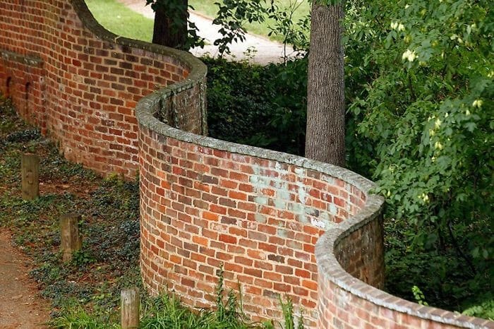 wavy brick walls in rural England built in a serpentine shape