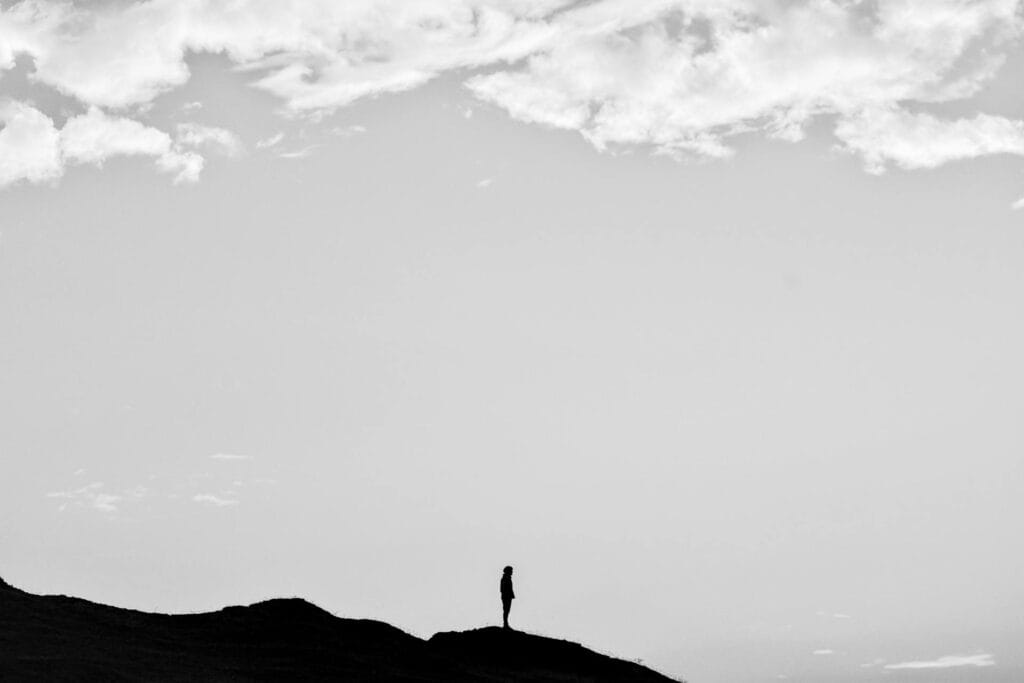 Man standing alone showcasing the path of dharma requires strict routine